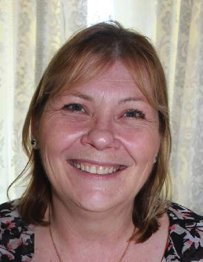 Photo of a woman smiling at the camera